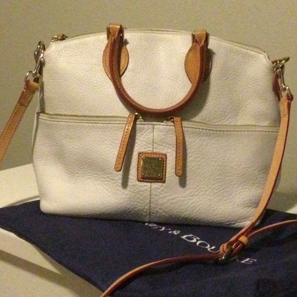 Dooney & Bourke!  Beautiful white summer bag.